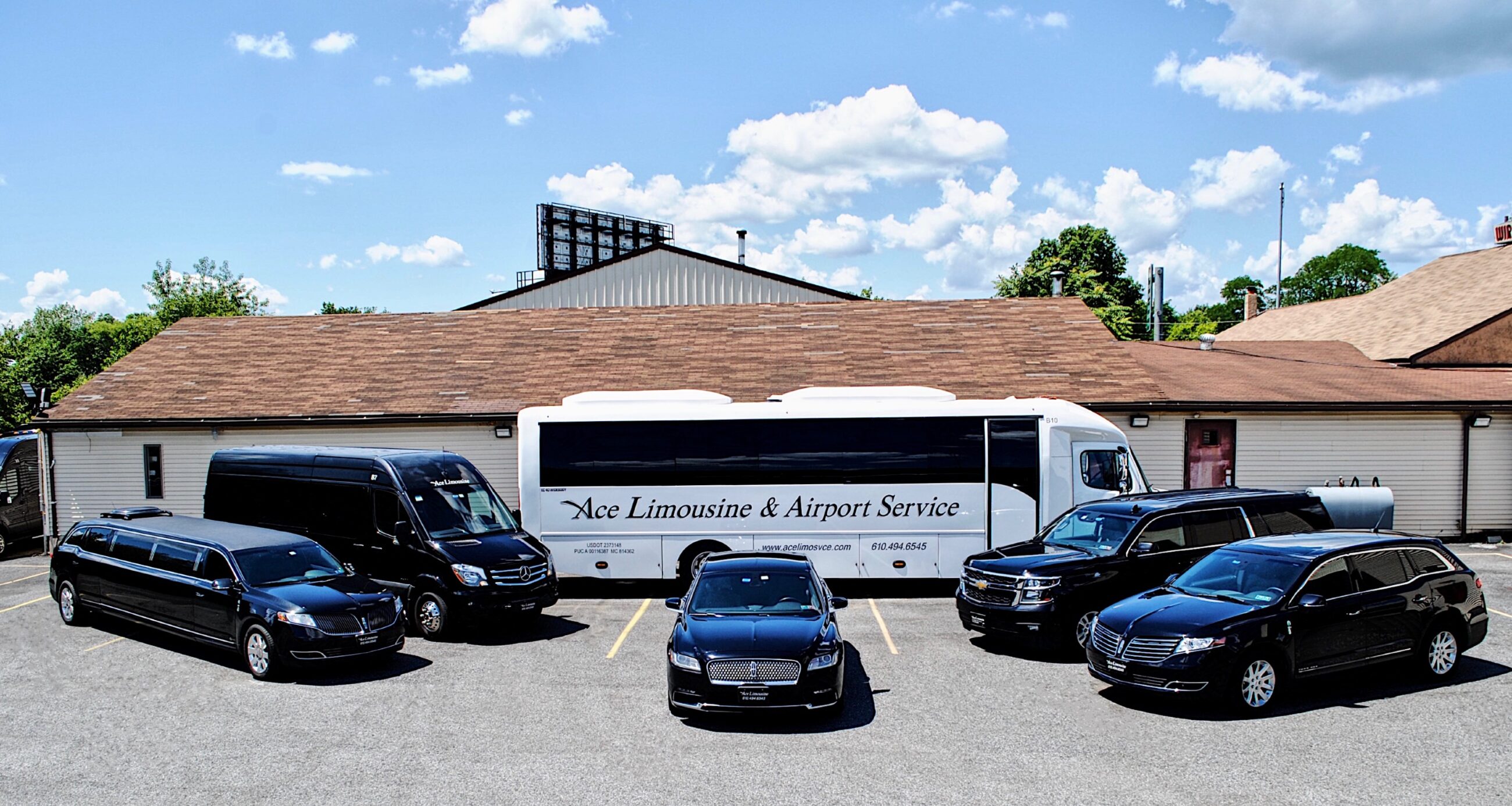 Ace Limousine fleet with charter bus